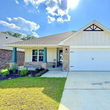 Rent this 3 bed house on 3822 Hawks Landing Circle in Pace, FL 32571