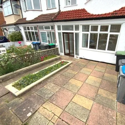 Rent this 3 bed townhouse on Thornhill Road in London, KT6 7SE
