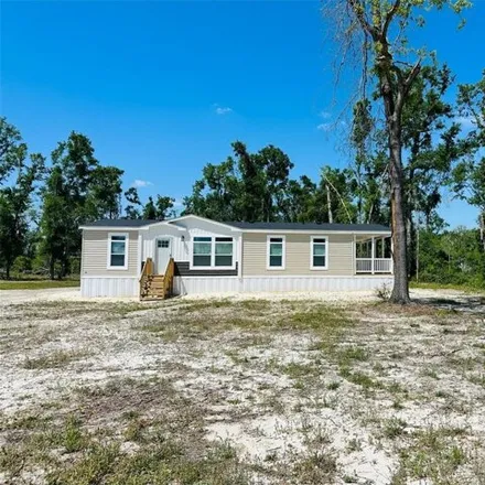Buy this studio apartment on 22510 CR 250 in Dowling Park, Suwannee County