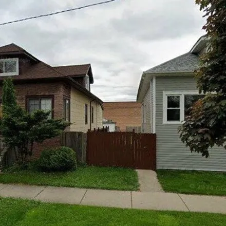 Buy this 4 bed house on 2704 North Neva Avenue in Chicago, IL 60634