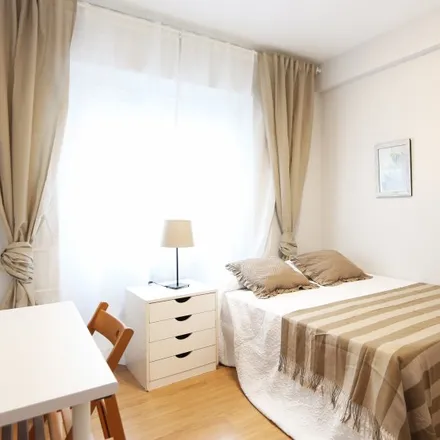 Rent this 5 bed room on Madrid in Reina Castilla, Calle de Rafael Herrera