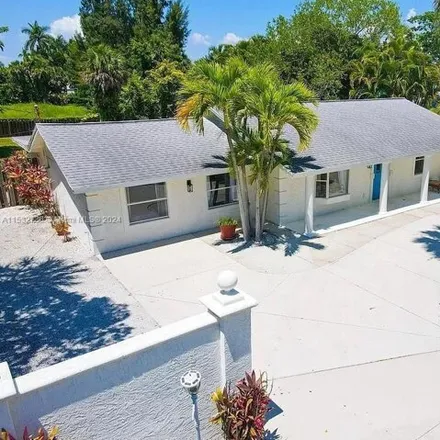 Buy this 4 bed house on 745 Siesta Drive in Sarasota, FL 34242
