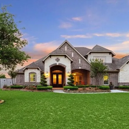 Buy this 4 bed house on 17897 Country Cove in Harris County, TX 77433
