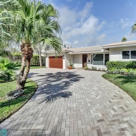 Buy this 3 bed house on 2699 Northeast 9th Court in Pinehurst Village, Pompano Beach
