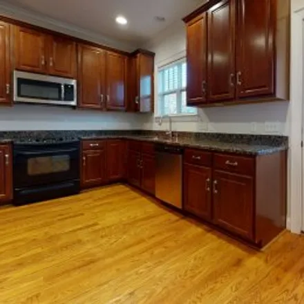 Rent this 4 bed apartment on 311 Woodvale Place in Tuckaseege Park, Charlotte
