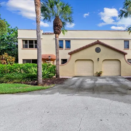 Buy this 2 bed townhouse on 466 Uno Lago Drive in Juno Beach, Palm Beach County