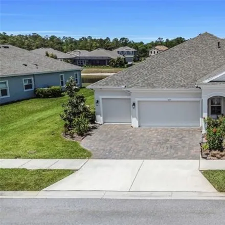 Buy this 3 bed house on Glade Wood Loop in Starkey Ranch, FL 34655