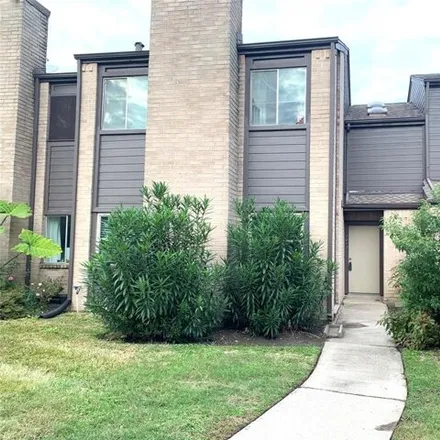 Buy this 2 bed townhouse on 2239 Oak Cloister Way in Houston, TX 77058