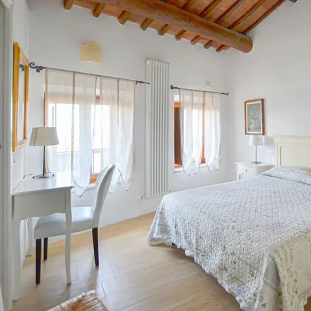 Rent this 2 bed townhouse on Cortona in Arezzo, Italy