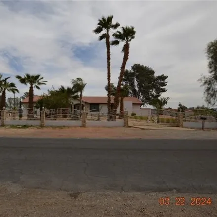 Rent this 4 bed house on 2936 Duneville Street in Spring Valley, NV 89146