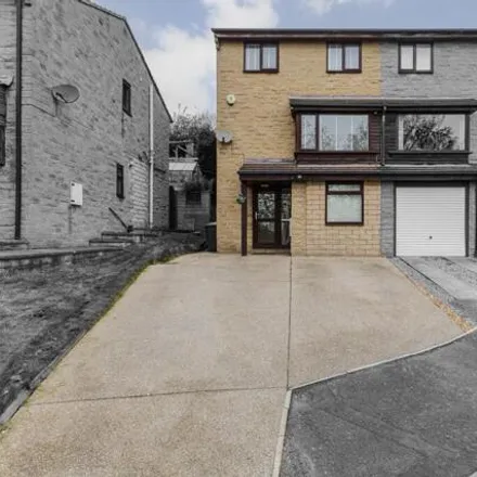 Buy this 3 bed townhouse on Camilla Court in Dewsbury, WF12 8LR