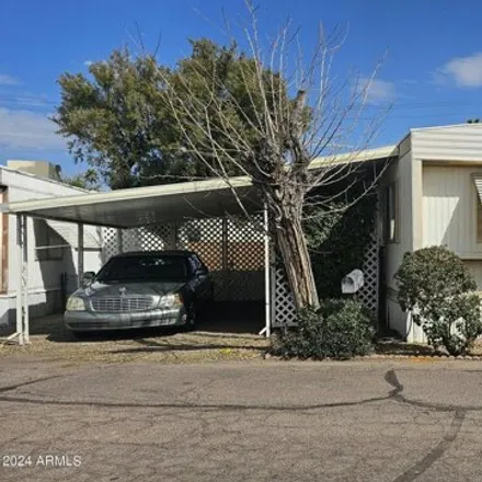 Buy this studio apartment on Mobile Home Park in Mesa, AZ 85203