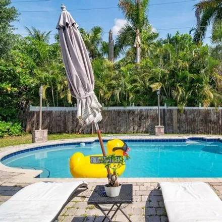 Rent this 3 bed house on 945 Northwest 26th Court in Jenada Isles, Wilton Manors