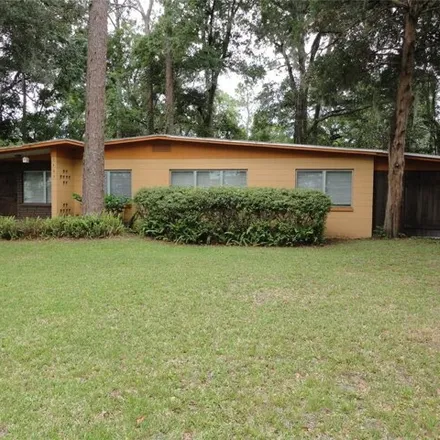 Rent this 3 bed house on 1397 Northeast 20th Place in Gainesville, FL 32609