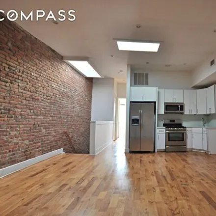 Rent this 3 bed house on 299 Pulaski Street in New York, NY 11206