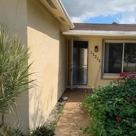 Rent this 3 bed house on 9587 Southwest 2nd Road in Palm Beach County, FL 33428