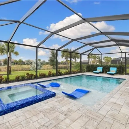 Buy this 5 bed house on 17531 Elkgrove Lane in Lee County, FL 33928