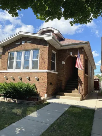 Buy this 4 bed house on 3104 North Parkside Avenue in Chicago, IL 60634