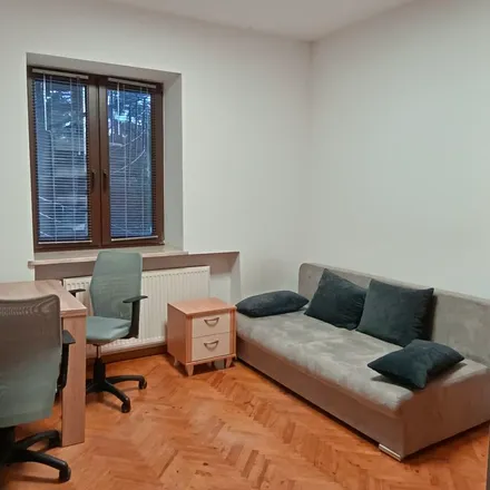 Rent this 6 bed apartment on Dąbrowa 45 in 30-381 Krakow, Poland