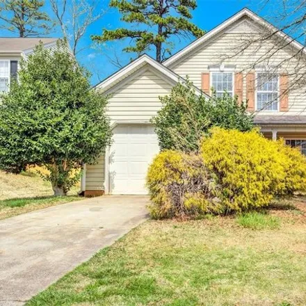 Buy this 4 bed house on 142 Winding Canyon Drive in Charlotte, NC 28214