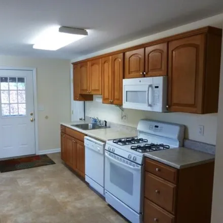 Rent this 2 bed townhouse on 121 New Market Rd in Dunellen, New Jersey