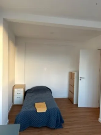 Rent this 6 bed room on Rua Joaquim Paço d'Arcos in 1500-083 Lisbon, Portugal