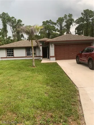 Buy this 3 bed house on 1903 East 7th Street in Lehigh Acres, FL 33972