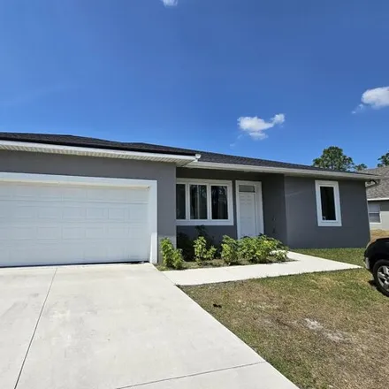 Image 1 - 1398 Cogan Drive Southeast, Palm Bay, FL 32909, USA - House for rent