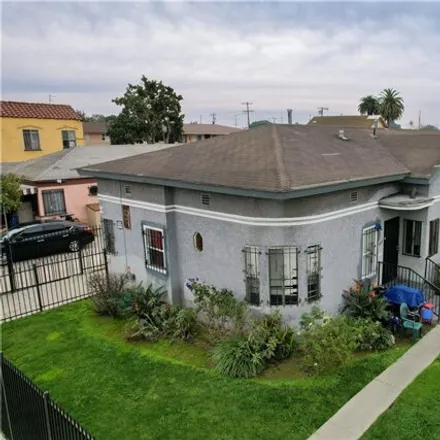 Image 1 - 1300 West 57th Street, Los Angeles, CA 90037, USA - House for sale