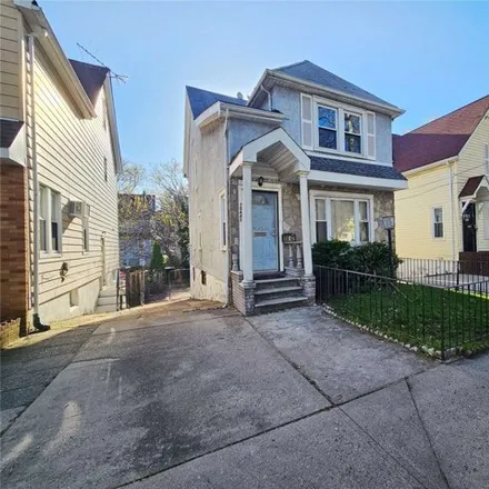 Buy this 3 bed house on 104-42 199th Street in New York, NY 11412