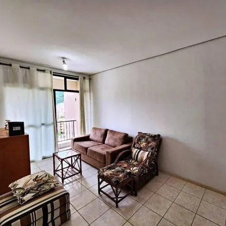 Buy this 2 bed apartment on Avenida Puglisi in Pitangueiras, Guarujá - SP