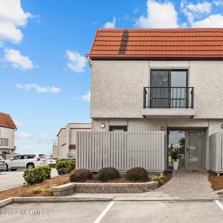 Buy this 3 bed townhouse on 4801 South Shore Drive in Mitchell Village, Morehead City