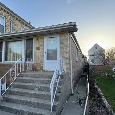 Buy this 3 bed house on 4354 South Wood Street in Chicago, IL 60636