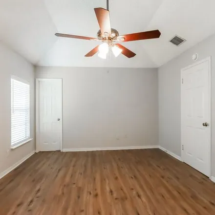 Rent this 3 bed apartment on 9100 Towerstone Court in Harris County, TX 77379