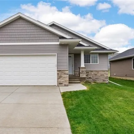 Buy this 4 bed house on 5112 Dostal Drive Southwest in Cedar Rapids, IA 52404