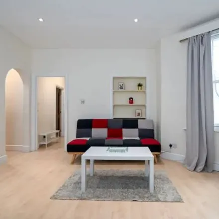 Rent this 3 bed apartment on 10 Russell Gardens in London, W14 8EZ