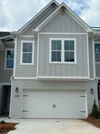 Rent this 4 bed townhouse on Willowcrest Way in Forsyth County, GA 30128