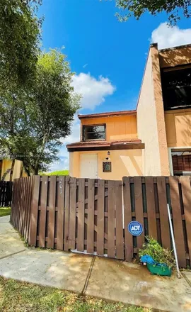 Rent this 3 bed townhouse on 415 West Park Drive in Miami-Dade County, FL 33172