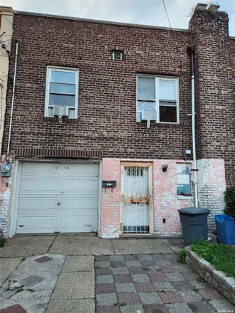 Buy this 3 bed house on 102-16 187th Street in New York, NY 11423