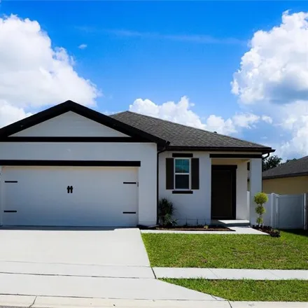Rent this 3 bed house on 1047 Aerides Way in Davenport, Polk County