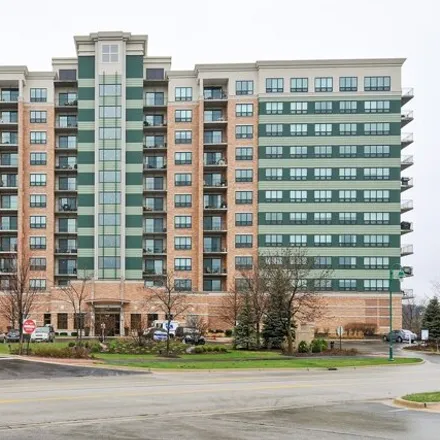 Buy this 2 bed condo on Main Street at Seven Bridges in Condominium Residences at Seven Bridges, 6420 Double Eagle Drive