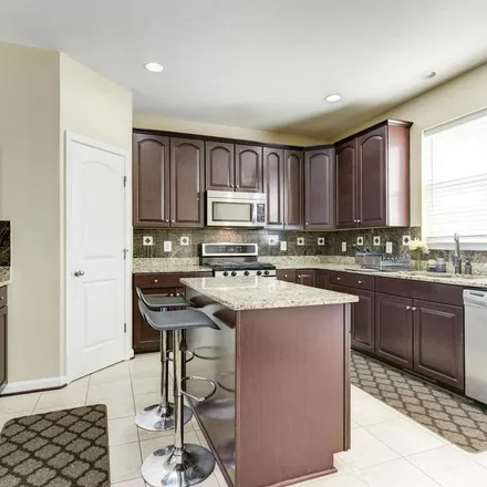 Rent this 3 bed apartment on 42657 Winter Wind Terrace in Brambleton, VA 20148