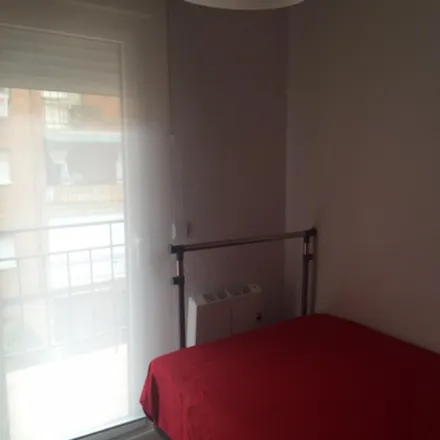 Rent this 4 bed room on Madrid in Calle Nardos, 4