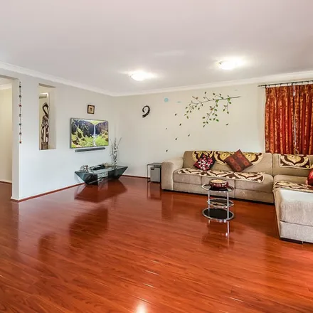 Rent this 3 bed apartment on Eleanor Drive in Glenfield NSW 2167, Australia