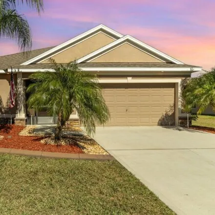 Buy this 4 bed house on 2632 Snapdragon Drive in Palm Bay, FL 32907