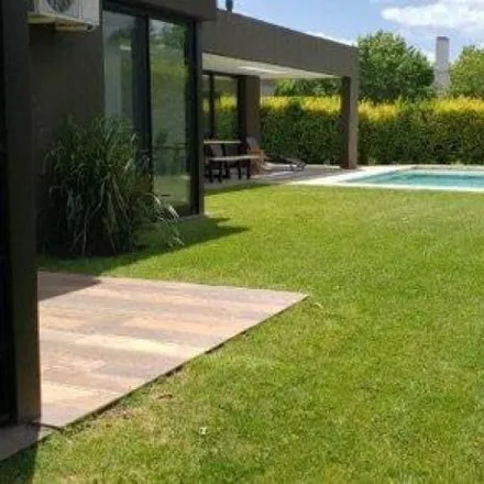 Rent this 3 bed house on unnamed road in Bosque de Peralta Ramos, B7603 DRT Mar del Plata