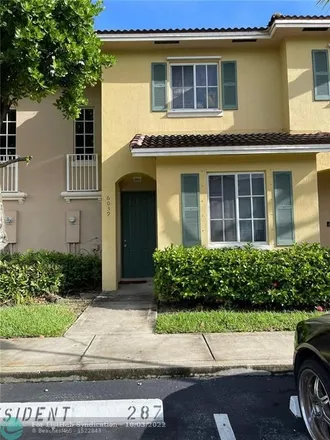 Buy this 3 bed townhouse on 6039 Southwest 19th Court in Pompano Park, North Lauderdale