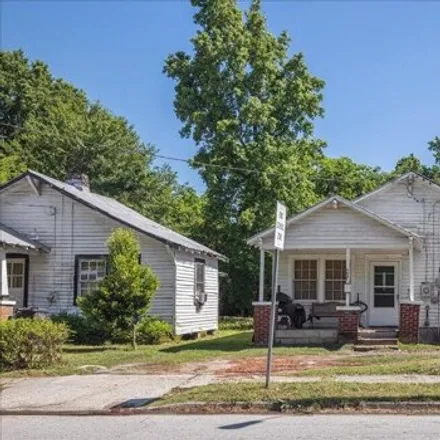 Buy this 1 bed house on 1374 Wrightsboro Road in Augusta, GA 30901