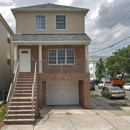 Rent this 3 bed house on 74 Cottage Street in Port Johnson, Bayonne