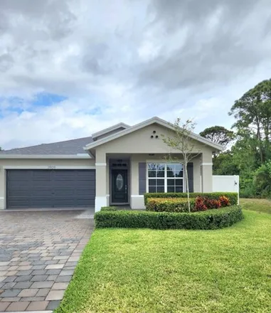 Rent this 4 bed house on 3937 Southeast Lee Street in Port Salerno, FL 34997